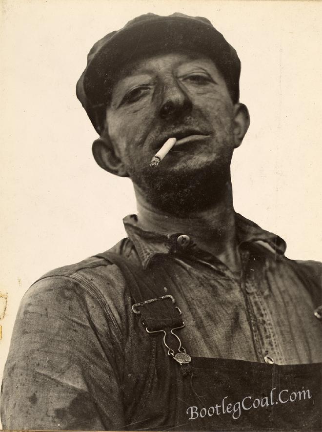 A bootleg miner smoking a cigarette